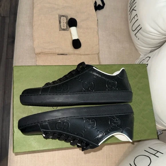 Gucci Black Embossed GG Leather Low-Top Sneakers